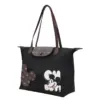 Black nylon tote bag featuring Mickey Mouse "Oh Boy" print and brown leather handles, side angle view.