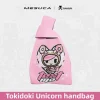 Pink Tokidoki knit wristlet bag with adorable cat girl character jacquard print and soft wide wrist strap for women.