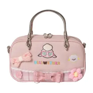 Direct front shot of a pastel pink mini tote bag with embroidered sheep face wearing glasses, lace trim, bow tie, crochet flowers, and "BELLWETHER" text.