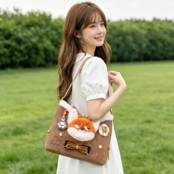 Side profile of the soft brown suede bag showing its slouchy shape and adjustable strap worn by a model in a field.