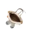 Top-down view showing the cozy cream fleece lining inside the grey Judy Hopps bag, revealing spacious compartments and zipper pockets.
