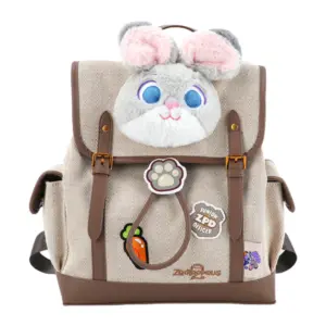 Front view of a beige canvas backpack with Judy Hopps plush head, "Junior ZPD Officer" badge, and carrot accessory.