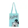 Front view of a turquoise knit tote bag featuring a shy Mickey Mouse graphic and cursive "Mickey" text with clouds.