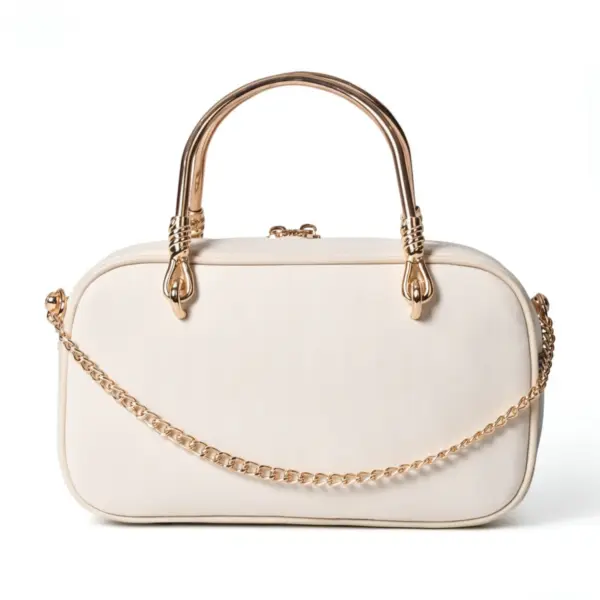Clean back view of the structured shoulder bag showcasing the smooth cream canvas texture and detachable gold chain strap.