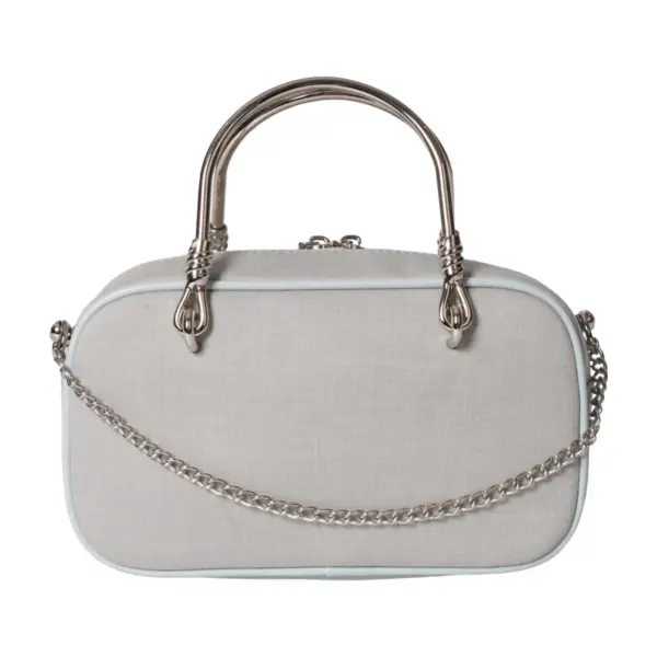 Clean back view of the structured shoulder bag showcasing the smooth light grey canvas texture and detachable silver chain strap.