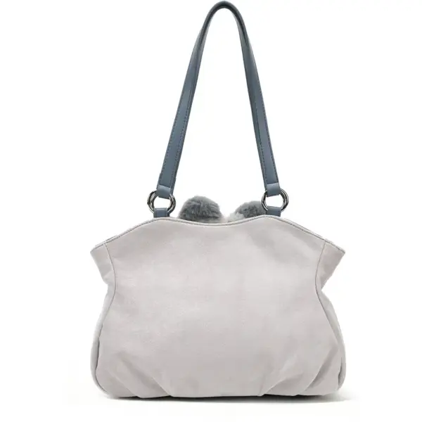 Clean back view of the soft grey microfiber hobo bag with dark grey adjustable straps, showing its smooth texture.