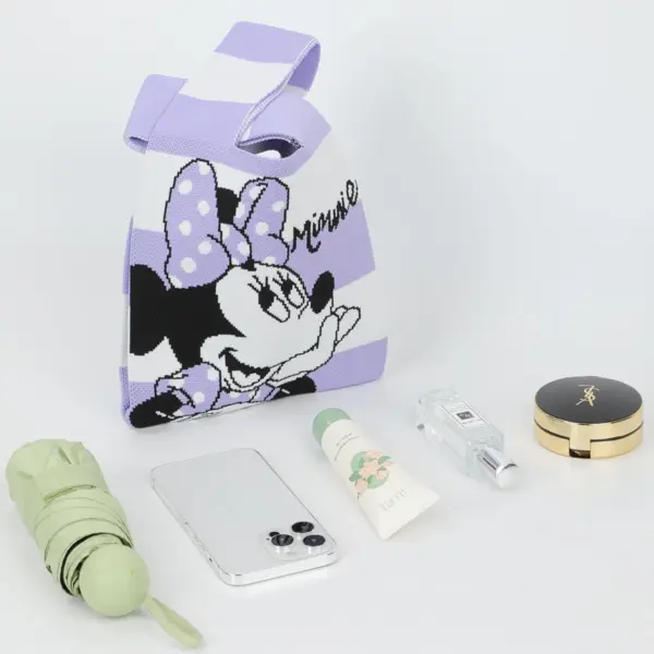 Flat lay showing a purple Minnie Mouse knit pouch next to a phone, umbrella, perfume, and makeup compact.