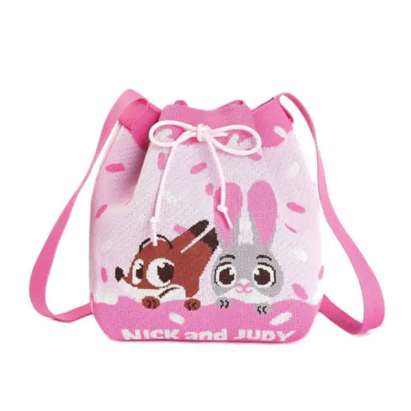 Front view of a pink knitted bucket bag featuring cute Nick Wilde and Judy Hopps characters peeking over a donut frosting design.