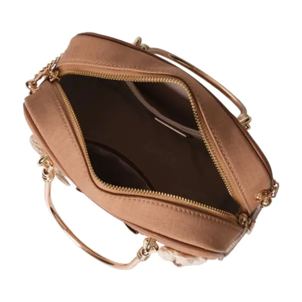 Top-down open view revealing the organized compartments and ample storage space inside the vintage-style carryall.