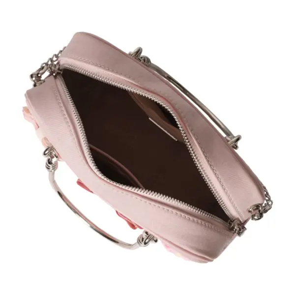 Top-down open view revealing the organized compartments and ample storage space inside the vintage-style carryall.