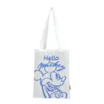 Front view of a white knit tote bag with a blue hand-drawn Mickey Mouse graphic and "Hello Mickey" text.