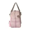 Side profile of a pink canvas doctor bag featuring plaid patchwork, silver metal handle, and chain strap details.