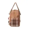 Side profile of a brown canvas doctor bag featuring plaid patchwork, gold metal handle, and chain strap details.