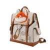Side angle of a beige herringbone backpack featuring a plush Nick Wilde face, brown leather straps, and ZPD patches.